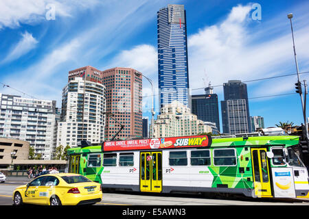 Melbourne Australia,Southbank,Princes Bridge,St. Kilda Road,tram,trolley,traffic,city skyline,high rise,buildings,skyscrapers,Eureka Tower,tallest bui Stock Photo