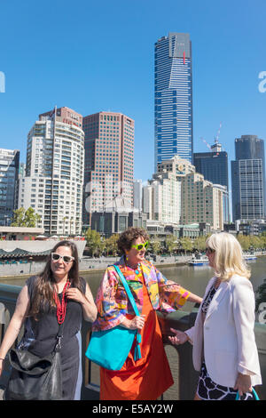 Melbourne Australia,Southbank,Princes Bridge,St. Kilda Road,Yarra River,Eureka Tower,tallest building,city skyline,skyscrapers,woman female women,frie Stock Photo
