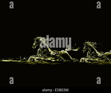 Silhouettes of two running horses made of liquid gold on black. Stock Photo