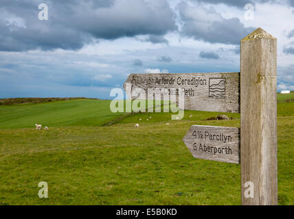 Finger-post sign for the Ceredigion Coast Path at Mwnt, Ceredigion, Wales, UK. Stock Photo