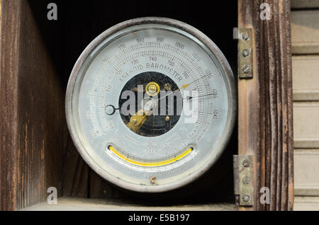 A barometer, used in meteorology to measure atmospheric pressure. Stock Photo