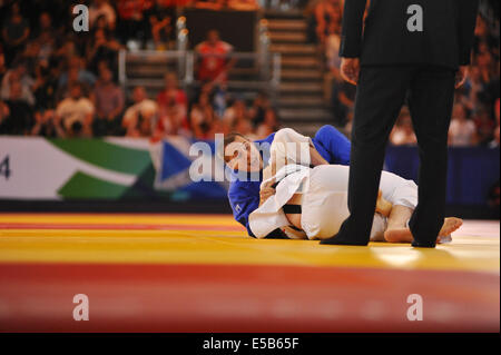 Glasgow, Scotland, UK. 26th July, 2014. Dramatic scenes as Euan Burton (SCO, blue) fights Jason Koster (NZL, white) to go through to the Men's -100kg Judo Final. Credit:  Michael Preston/Alamy Live News Stock Photo