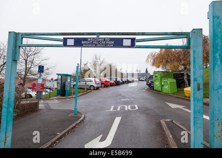 Car park entrance with its height restriction barrier and sign, Bright Hill, Guildford, Surrey, England. Stock Photo