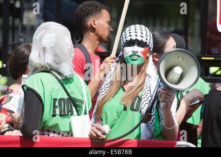 London, UK. 26 July 2014. Protesters gathered near the Israeli Embassy in Kensington High Street, London, ahead of a march to Parliament Square to call for an end to the Israeli military action against the Palestinians in the Gaza Strip. Credit:  Nick Savage/Alamy Live News Stock Photo