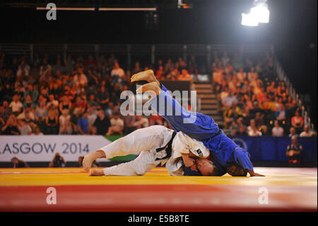 Glasgow, Scotland, UK. 26th July, 2014. Dramatic scenes as Jason Koster (NZL, white) fights Sahil Pathania (IND, blue) in the quarter finals of the Judo competition, XX Commonwealth Games. Jason Koster went through to the semi-final. Credit:  Michael Preston/Alamy Live News Stock Photo