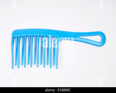 Blue plastic comb cut out isolated on white background Stock Photo