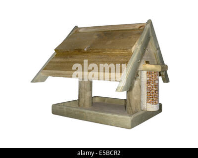 Wooden Bird Table. A common design for feeding garden birds. Stock Photo