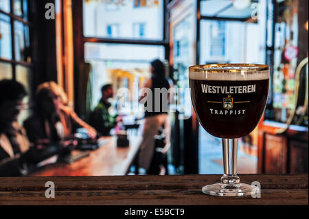 Glass with trappist Westvleteren - best beer in the world, brewed in the Sint-Sixtusabdij / Abbey of Saint Sixtus, Belgium Stock Photo