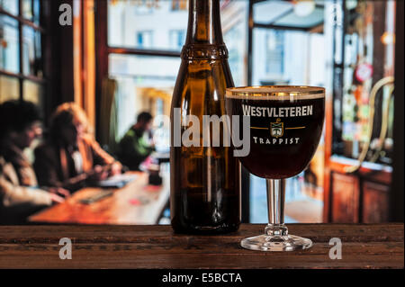Glass with trappist Westvleteren - best beer in the world, brewed in the Sint-Sixtusabdij / Abbey of Saint Sixtus, Belgium Stock Photo