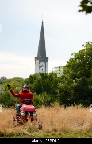 Torteval, Guernsey, Channel Islands. 26th July 2014. Crowds flock to the annual scarecrow festival. Held in the parish of Torteval it is now in its 11th year. This year the festival is being held on 26th and 27th July. Photo Robert Smith/Alamy Live News Stock Photo