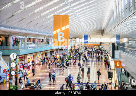 Passengers in Terminal B of Haneda Airport. Stock Photo
