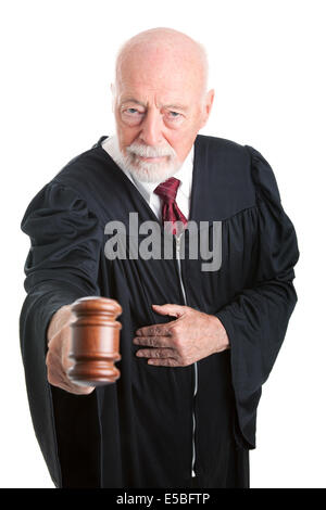 Serious judge banging his gavel in court.  Isolated on white. Stock Photo