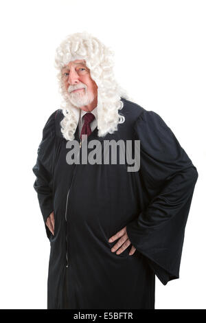 Serious looking judge wearing a wig.  Isolated on white. Stock Photo