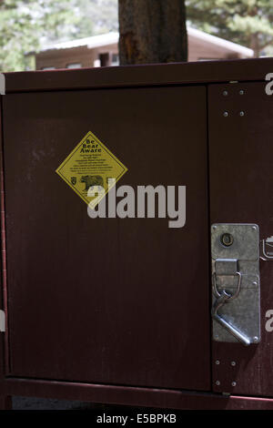 Bear proof food storage locker on a campsite  in the Sierra Nevada mountains . Stock Photo