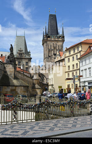 Closed padlocks as a symbol of love commitment along the railings of a bridge, Prague, Czech Republic. Stock Photo