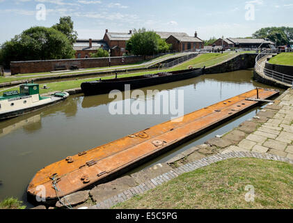 Old barge moored in lock on Shropshire Union Canal at National Waterways Museum Ellesmere Port Wirral Cheshire England UK Stock Photo