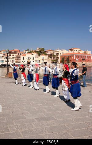 Tradional Greek Cretan Dancers, Chania harbour, Crete, Greece Stock Photo