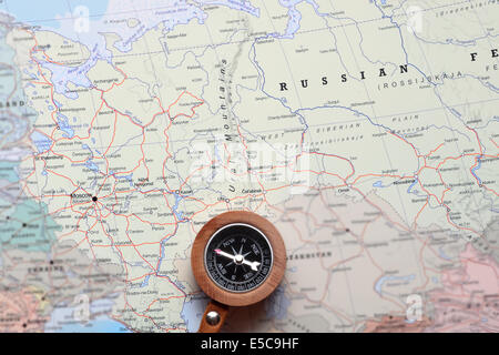 Compass on a map pointing at Moscow Russia, and planning a travel destination Stock Photo
