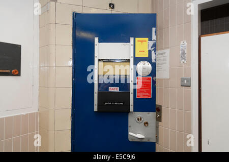 Metropolitan Police prisoner 's cell door in a Police station custody suite / suites / cell / cells in Twickenham. London UK Stock Photo