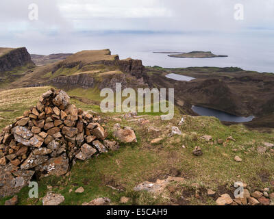 Summit cairn of Meall na Suiramach and Trotternish Ridge mountains, Flodigarry, Quiraing, Isle of Skye, Scotland, UK Stock Photo