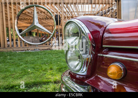 Warsaw, Poland. 27th July, 2014. Headlights of Mercedes-Benz W111 220 S during mercedes vintage cars show in Mercedes Station bar in Warsaw, Poland Credit:  kpzfoto/Alamy Live News Stock Photo