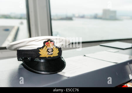 Belfast, Northern Ireland. 26/07/2014 - The hat of a Royal Navy Officer on the bridge of a ship Credit:  Stephen Barnes/Alamy Live News Stock Photo