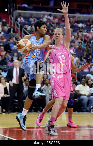 Washington, DC, USA. 27th July, 2014. 20140727 - Atlanta Dream guard Angel McCoughtry (35) looks to pass off the baseline against Washington Mystics forward Emma Meesseman (33) in the second half at the Verizon Center in Washington. The Mystics defeated the Dream, 77-67. © Chuck Myers/ZUMA Wire/Alamy Live News Stock Photo