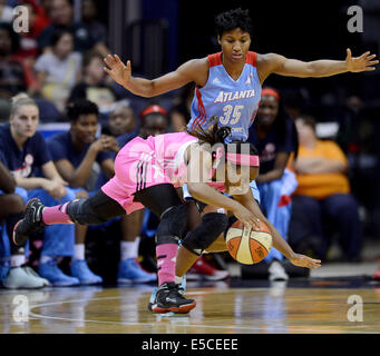 Washington, DC, USA. 27th July, 2014. 20140727 - Washington Mystics guard Ivory Latta (12) falls to the floor while trying to drive against Atlanta Dream guard Angel McCoughtry (35) in the second half at the Verizon Center in Washington. The Mystics defeated the Dream, 77-67 © Chuck Myers/ZUMA Wire/Alamy Live News Stock Photo