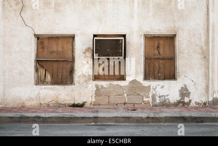 Old building wall with windows and outer air conditioner device. Background texture Stock Photo