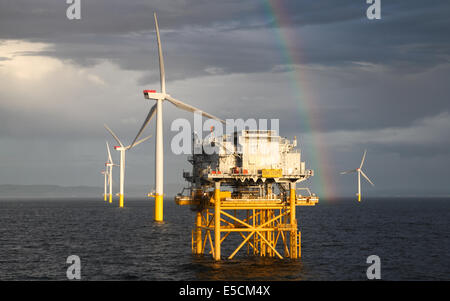 A rainbow on the Gwynt y Mor Wind Farm off the coast of North Wales during the Construction Phase in 2014. Stock Photo