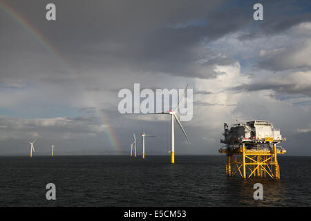 A rainbow on the Gwynt y Mor Offshore Wind Farm off the coast of North Wales during the Construction Phase in 2014. Stock Photo