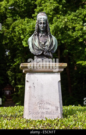Bust of Annette von Droste-Hülshoff in the gardens of Burg Hülshoff Castle, Havixbeck, Münsterland, North Rhine-Westphalia Stock Photo