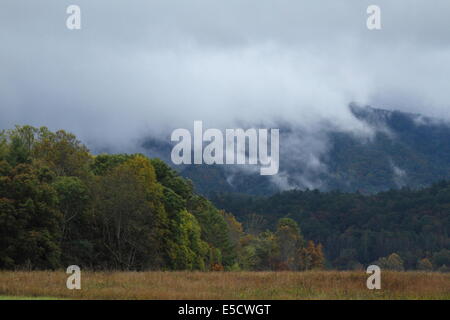 Fog envelopes mountain ridges around Cades Cove in the Great Smoky Mountains National Park, Tennessee, USA. Stock Photo