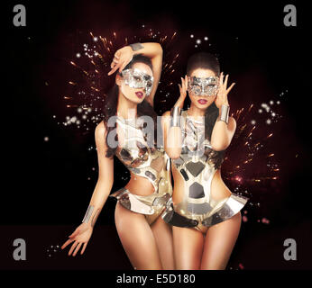 Firework & Fancy Dress Party. Showgirls over Sparkling Background Stock Photo