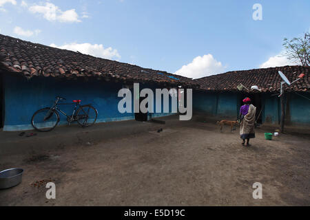 Tribal mud houses and courtyard. Baiga tribe. Karangra Village, Chattisgadh, India Stock Photo