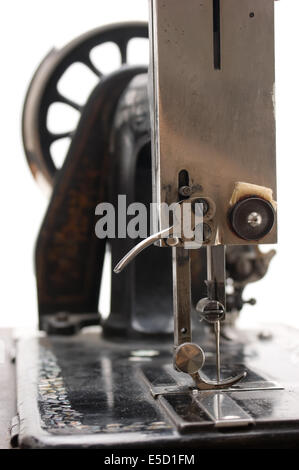 Old sewing machine  isolated on a white background Stock Photo