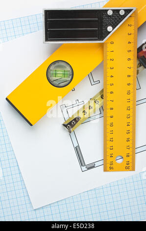 development drawings and tools on graph paper Stock Photo