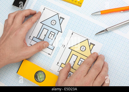 development drawings and tools on graph paper Stock Photo