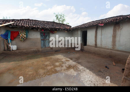 Tribal mud houses and courtyard. Baiga tribe. Chattisgadh, India Stock Photo