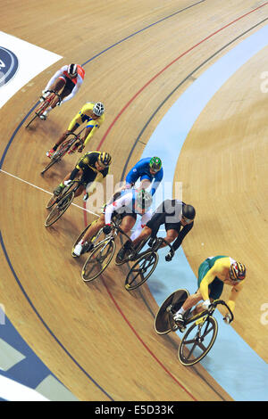 Glasgow, Scotland, UK. 27th July, 2014. A tight pack of riders racing in the Men's Keirin heats in the Sir Chris Hoy Velodrome, XX Commonwealth Games, Glasgow. Credit:  Michael Preston/Alamy Live News Stock Photo
