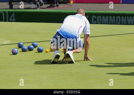 Kelvingrove Lawn Bowls Centre, Glasgow, Scotland, UK, Monday, 28th July, 2014. Scotland's Paul Foster during the Men's Lawn Bowls Pairs Final at the Glasgow 2014 Commonwealth Game Stock Photo