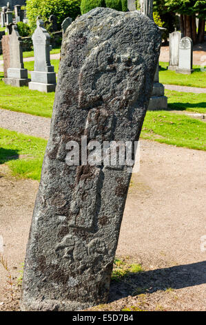 PICTISH BATTLESTONE IN MORTLACH CEMETERY DUFFTOWN SCOTLAND WITH A CELTIC CROSS A PAIR OF FISH MONSTERS AND A BEAST Stock Photo