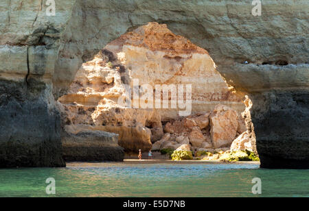 Rocky arch and beach on the Algarve coast, near Benagil,  Portugal Europe Stock Photo