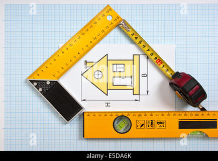 construction drawings and tools on graph paper Stock Photo
