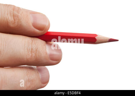 red pencil in hand  isolated on white background Stock Photo