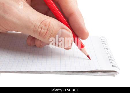 red pencil in hand  isolated on white background Stock Photo