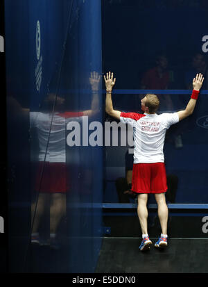 Glasgow, Scotland. 28th July, 2014. Nick Matthew of England celebrates after the Men's Singles Gold medal Final of Squash against James Willstrop of England on day 5 of the Glasgow 2014 Commonwealth Games at Scotstoun Sports Campus in Glasgow, Scotland, on July 28, 2014. Nick Matthew won 3-2. Credit:  Wang Lili/Xinhua/Alamy Live News Stock Photo