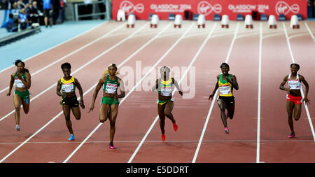 Glasgow, Scotland, UK. 28th July, 2014. Blessing Okagbare (3rd L) of Nigeria competes during the women's 100m final at the 2014 Glasgow Commonwealth Games in Hampden Park in Glasgow, Scotland on July 28, 2014. Blessing Okagbare won the gold medal with a time of 10.85 seconds. Credit:  Han Yan/Xinhua/Alamy Live News Stock Photo