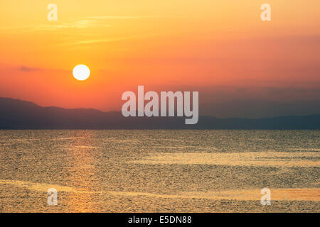 Asia, Japan, Kyushu, Kagoshima, sunrise over Sakurajima volcano Stock Photo