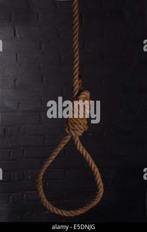 loop of gallows on wall background Stock Photo